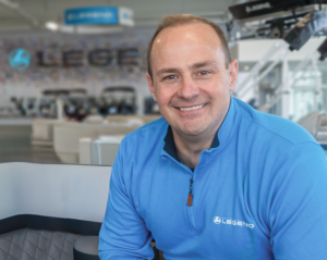 Jamie Dewar, Co-CEO, of Legend Boats, sitting in Whitefish Headquarters.